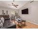 Bright living room featuring hardwood floors and comfortable seating at 901 N Quartz St, Gilbert, AZ 85234