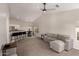 Open-concept living room with high ceilings, modern decor, and a view to the kitchen at 901 N Quartz St, Gilbert, AZ 85234