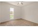 Cozy bedroom with neutral carpet and a window to bring in natural light at 908 S Kachina --, Mesa, AZ 85204