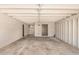 The carport includes a concrete floor and white painted walls and ceiling at 908 S Kachina --, Mesa, AZ 85204