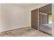 This room features concrete flooring and access to the carport at 908 S Kachina --, Mesa, AZ 85204