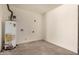 A view of the utility room featuring a gas water heater at 908 S Kachina --, Mesa, AZ 85204