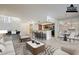 Bright, staged living space with open floor plan, breakfast bar, and dining area perfect for modern living at 9705 E Mountain View Rd # 1096, Scottsdale, AZ 85258