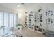 Bright office space with custom shelving and large windows, creating an inspiring and productive work environment at 9705 E Mountain View Rd # 1096, Scottsdale, AZ 85258