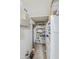 Walk-in pantry features white shelving for ample storage and organization in this home at 9705 E Mountain View Rd # 1096, Scottsdale, AZ 85258