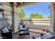 Outdoor patio offers a cozy seating area with desert landscaping at 9705 E Mountain View Rd # 1096, Scottsdale, AZ 85258