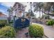 Welcome to the Racquet Club, featuring beautiful landscaping, a quaint tower, and a picturesque walking bridge at 9705 E Mountain View Rd # 1096, Scottsdale, AZ 85258