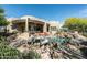 Inviting backyard with a pool, spa, and patio, perfect for outdoor living and entertaining at 10822 E Prospect Point Dr, Scottsdale, AZ 85262