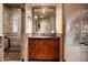 Bathroom features wood cabinets, granite counters, and walk-in shower at 10822 E Prospect Point Dr, Scottsdale, AZ 85262