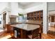 Gourmet kitchen features custom cabinetry, granite countertops, and a spacious center island at 10822 E Prospect Point Dr, Scottsdale, AZ 85262