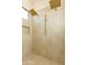 Contemporary shower with dual shower heads and a convenient niche for toiletries at 10918 W Dove Roost Rd, Queen Creek, AZ 85144
