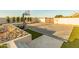 Backyard sport court featuring a basketball hoop, hockey net, and plenty of space for recreational activities at 10918 W Dove Roost Rd, Queen Creek, AZ 85144