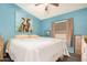 Comfortable bedroom featuring wood look floors and a large window at 11596 W Sierra Dawn Blvd # 271, Surprise, AZ 85378