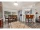 Open floor plan connecting the dining area, kitchen, and bar seating, perfect for entertaining guests and Gathering at 11596 W Sierra Dawn Blvd # 271, Surprise, AZ 85378