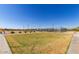 Spacious community lawn near the pickleball courts, perfect for recreation and outdoor activities at 11596 W Sierra Dawn Blvd # 271, Surprise, AZ 85378