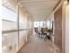 Enclosed patio featuring neutral privacy shades and seating area at 11596 W Sierra Dawn Blvd # 271, Surprise, AZ 85378