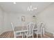 A beautifully staged dining room with a chandelier and a formal dining set at 1207 E Clearview Dr, Casa Grande, AZ 85122