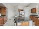 Open kitchen features granite counters, an island sink, and stainless appliances at 1207 E Clearview Dr, Casa Grande, AZ 85122