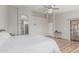 Bright main bedroom with en-suite bathroom access and hardwood floors at 1207 E Clearview Dr, Casa Grande, AZ 85122