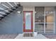 Close up of front door to unit 112 with address, plants and window at 1241 E Medlock Dr # 112, Phoenix, AZ 85014