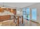 Charming kitchen featuring a breakfast bar and stainless steel appliances at 1241 E Medlock Dr # 112, Phoenix, AZ 85014