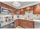 Bright kitchen featuring stainless steel appliances, modern cabinets, and ample counter space at 1241 E Medlock Dr # 112, Phoenix, AZ 85014