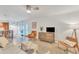 Open-concept living area with modern decor, and a breakfast bar leading to the kitchen at 1241 E Medlock Dr # 112, Phoenix, AZ 85014