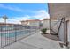 Community pool and patio area with landscaping in front of the building at 1241 E Medlock Dr # 112, Phoenix, AZ 85014
