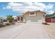 Charming single-Gathering home with a two-car garage and well-maintained desert landscaping at 12626 W Windsor Ave, Avondale, AZ 85392