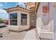 Close-up view of the front door and bay window, showing house number at 12626 W Windsor Ave, Avondale, AZ 85392