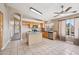 Charming kitchen with a center island, stainless appliances, and tile flooring at 12626 W Windsor Ave, Avondale, AZ 85392