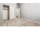 Neutral bedroom with closet and doorway to another room at 12702 W Dove Wing Way, Peoria, AZ 85383