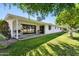 Expansive backyard with covered patio, promising outdoor living and enjoyment in a tranquil, green environment at 12726 W Copperstone Dr, Sun City West, AZ 85375