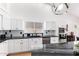 Bright kitchen features stainless appliances, modern fixtures, and ample counter space at 1432 W Hopi Dr, Chandler, AZ 85224