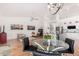 Open-concept living space with modern kitchen, breakfast nook, and bright natural light at 1432 W Hopi Dr, Chandler, AZ 85224