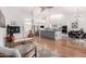 Bright, open-concept living space with modern kitchen, island, stainless appliances, and vaulted ceiling at 1432 W Hopi Dr, Chandler, AZ 85224