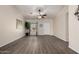 Inviting living room showcasing modern floors, neutral walls, and ample natural light at 15047 W Kings Dr, Surprise, AZ 85374