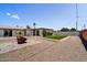 Backyard featuring rock and artificial turf at 15049 N 25Th Pl, Phoenix, AZ 85032