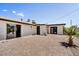 The backyard patio features custom brickwork, perfect for outdoor entertaining at 15049 N 25Th Pl, Phoenix, AZ 85032