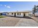Single story house featuring a covered carport and a low maintenance gravel yard at 15049 N 25Th Pl, Phoenix, AZ 85032