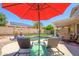 Inviting backyard pool featuring ample seating, lush landscaping, and a relaxing atmosphere at 17710 W Buena Vista Dr, Surprise, AZ 85374