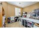 Bright office space with white cabinets and plenty of storage for a productive work environment at 17710 W Buena Vista Dr, Surprise, AZ 85374