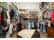 Walk-in closet features shelving and storage space at 17710 W Buena Vista Dr, Surprise, AZ 85374