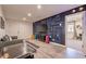 Finished basement with a gaming theme and fun wall art at 1911 E Claremont St, Phoenix, AZ 85016