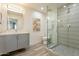 Modern bathroom featuring a glass shower, sleek vanity, and stylish fixtures at 1911 E Claremont St, Phoenix, AZ 85016