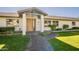 Eye-catching entry with desert landscaping and modern architecture at 1911 E Claremont St, Phoenix, AZ 85016
