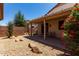 The home's relaxing covered back patio features desert landscaping and low maintenance yard at 19963 N Window Rock Dr, Surprise, AZ 85374