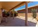 Relaxing covered back patio with desert landscaping and low maintenance yard at 19963 N Window Rock Dr, Surprise, AZ 85374