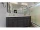 Bathroom with double vanity and stylish cabinets, countertops, and lighting at 19963 N Window Rock Dr, Surprise, AZ 85374