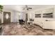 Bright living room with tiled floors, a comfortable white couch, and stylish décor at 2231 E Weldon Ave, Phoenix, AZ 85016